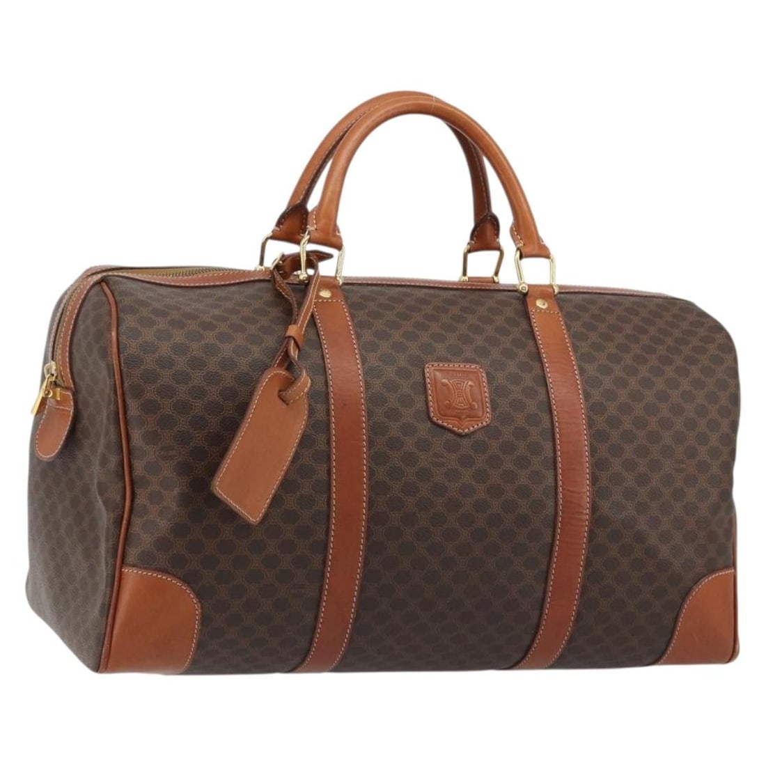 CELINE Macadam Boston Bag Brown PVC Leather with Name Tag: CELINE Macadam Boston Bag Brown PVC Leather with Name Tag CELINE Boston bag in brown and gold PVC leather with Macadam canvas details. Made in Italy, this women's bag measures approximately 44 cm wide