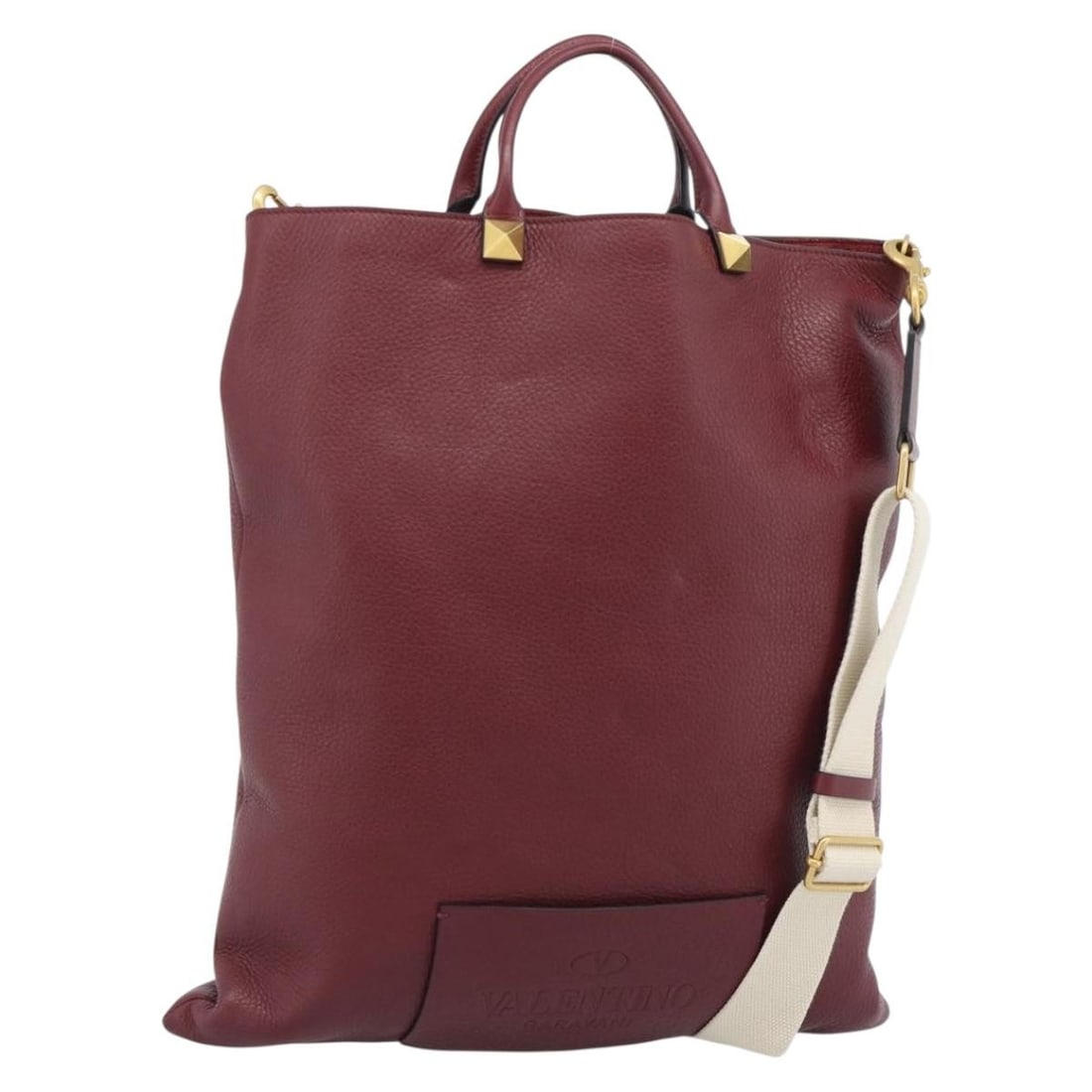 VALENTINO Leather 2way Tote Bag Bordeaux with Shoulder Strap: VALENTINO Leather 2way Tote Bag Bordeaux with Shoulder Strap Valentino 2-way tote bag in bordeaux leather with gold-tone accents. Made in Italy, this women's bag includes a dust bag and shoulder strap