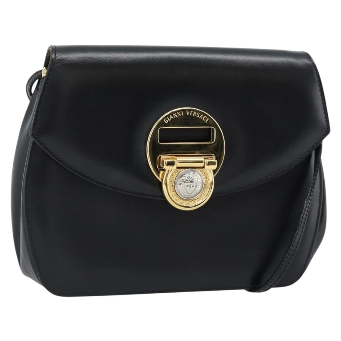 Black Leather Shoulder Bag by Gianni Versace Gold Tone: Black Leather Shoulder Bag by Gianni Versace Gold Tone Black and gold leather shoulder bag made in Italy. The bag features a shoulder strap and measures approximately W18 cm x H15 cm x D6 cm, with a s