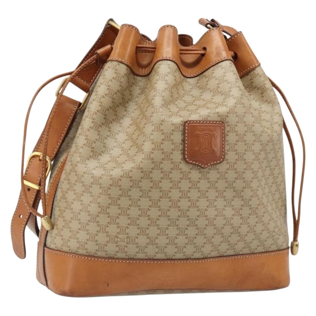 CELINE Macadam Shoulder Bag Beige PVC Leather Gold Tone: CELINE Macadam Shoulder Bag Beige PVC Leather Gold Tone CELINE Macadam Canvas shoulder bag in beige and gold, made in Italy from PVC leather and Macadam canvas. It features a shoulder strap with an ap