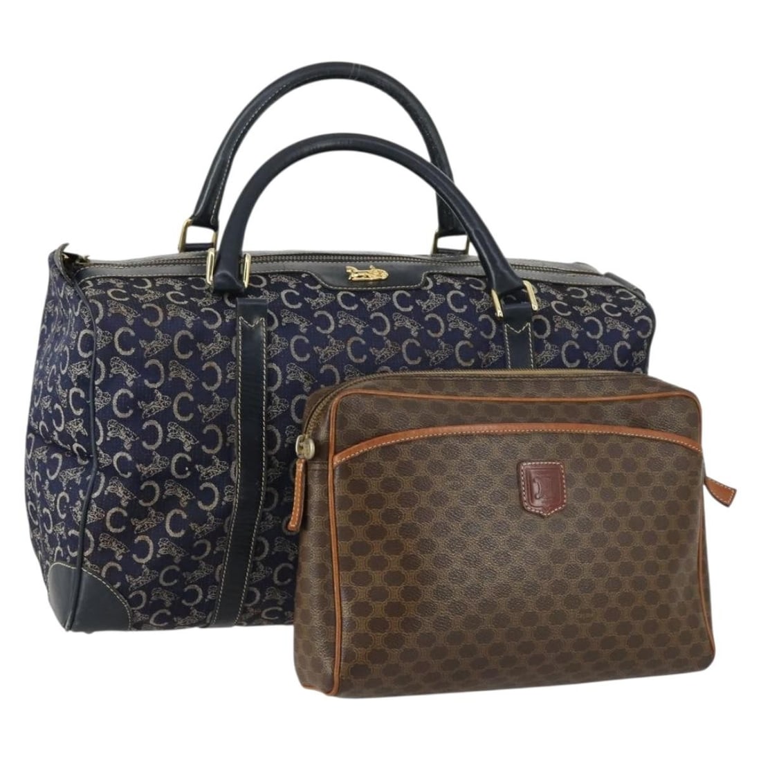 CELINE Macadam Canvas C Sulky Hand Bag PVC 2 Set Brown Navy Authentic: CELINE Macadam Canvas C Sulky Hand Bag PVC 2 Set Brown Navy Authentic This authentic CELINE Macadam Canvas C Sulky Hand Bag showcases a stylish blend of brown and navy PVC leather and Macadam canvas. 