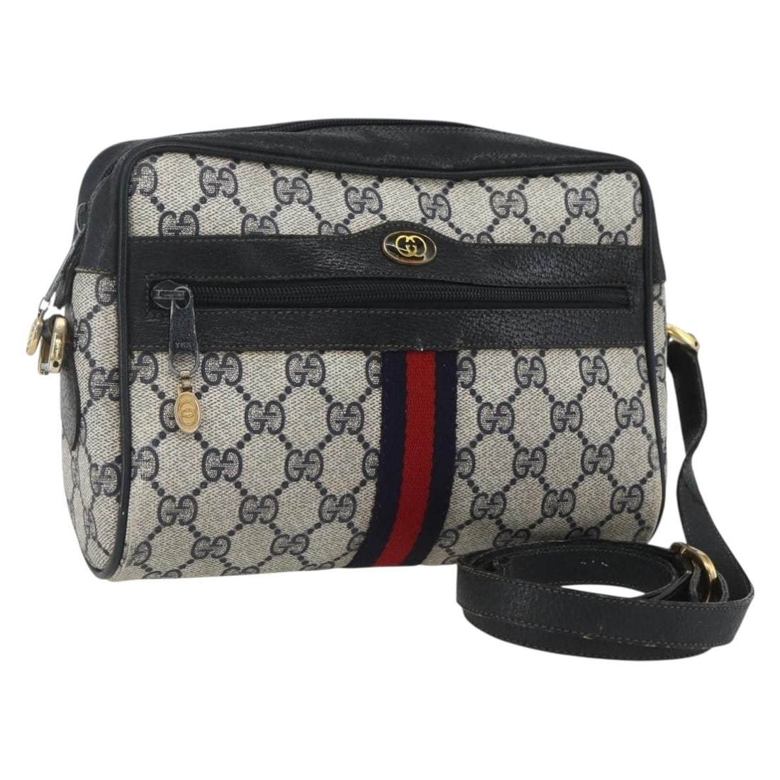 Gucci Sherry Line navy gold GG canvas shoulder bag 75 02 004: Gucci Sherry Line navy gold GG canvas shoulder bag 75 02 004 This is a Gucci GG Supreme Sherry Line shoulder bag crafted from navy and gold GG canvas. Designed for women, the bag features a compact si