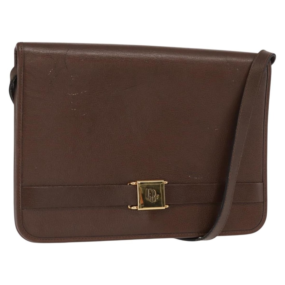 Brown Leather Shoulder Bag by Christian Dior Gold Accents France: Brown Leather Shoulder Bag by Christian Dior Gold Accents France This Christian Dior shoulder bag features brown leather with gold accents. Made in France, the bag offers a compact and elegant design 