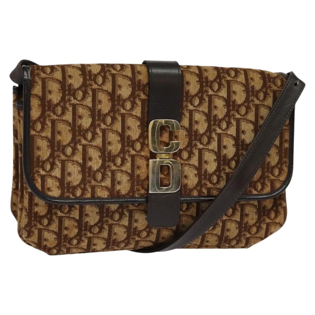 Brown Gold Trotter Canvas Shoulder Bag by Christian Dior: Brown Gold Trotter Canvas Shoulder Bag by Christian Dior This Christian Dior Trotter Canvas shoulder bag features a brown and gold exterior crafted from signature Trotter canvas. Designed for women, i