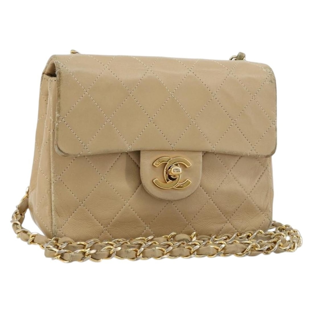 CHANEL CC Mini Shoulder Bag Beige Lamb Skin Chain Strap: CHANEL CC Mini Shoulder Bag Beige Lamb Skin Chain Strap Mini matelasse chain shoulder bag in beige lamb skin with CC detailing. This women's shoulder bag was made in France and has been customized wit