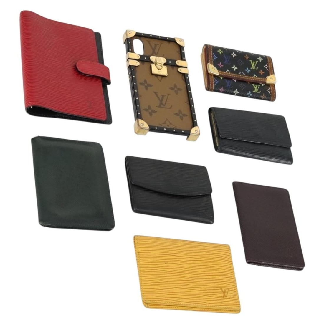Set of 8 Louis Vuitton Epi Leather Key Cases in Red Yellow Black: Set of 8 Louis Vuitton Epi Leather Key Cases in Red Yellow Black This Louis Vuitton Epi key case set features three key cases in red, yellow, and black Epi leather. The set includes an address book ac