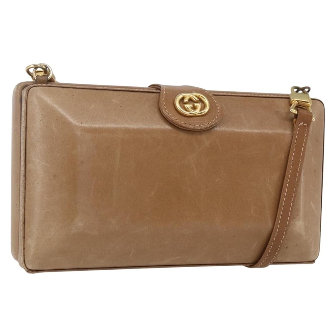 Beige Leather Shoulder Bag by Gucci Gold Tone Accents Italy: Beige Leather Shoulder Bag by Gucci Gold Tone Accents Italy This is a GUCCI shoulder bag crafted from beige and gold leather. The bag features a compact design with a shoulder strap that allows for co