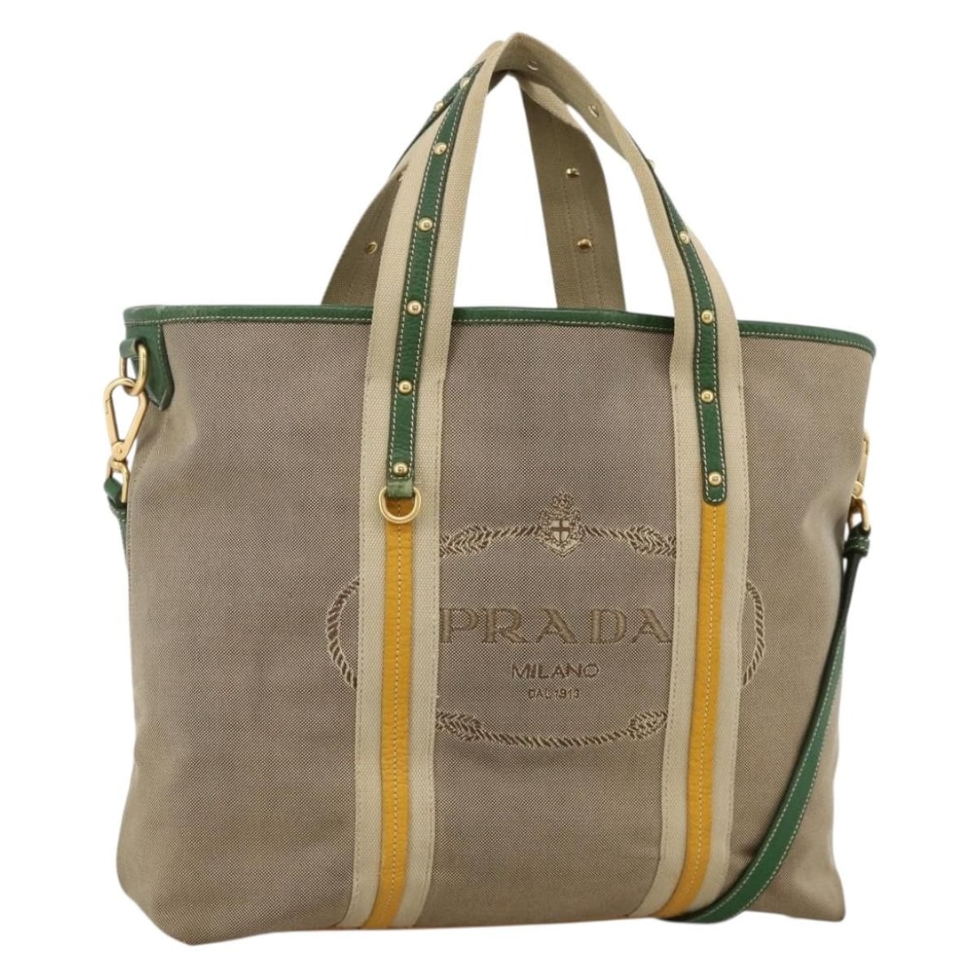 PRADA Beige Canvas 2way Tote Bag with Shoulder Strap: PRADA Beige Canvas 2way Tote Bag with Shoulder Strap Prada 2-way tote bag in beige and gold canvas with dual carry options. Includes a name tag and shoulder strap. Made in Italy. Condition is heavily 