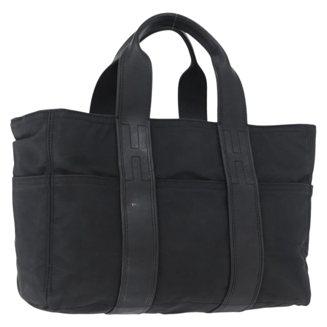 Hermes Acape Luco PM Black Nylon Handbag France: Hermes Acape Luco PM Black Nylon Handbag France Hermes Acape Luco PM hand bag in black nylon, made in France. The item is described as heavily used, with the nylon noted as sticky all over. Condition 