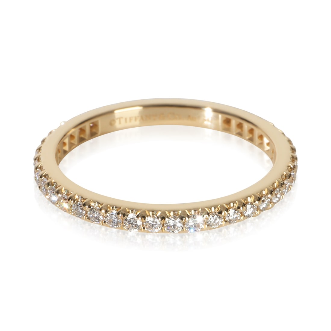 Tiffany & Co. Soleste Eternity Diamond Band Ring 18k Yellow Gold Size 5.5: Tiffany & Co. Soleste Eternity Diamond Band Ring 18k Yellow Gold Size 5.5 Pre-owned Tiffany & Co. Soleste Eternity band crafted in 18k yellow gold and set with round brilliant diamonds. This women's b