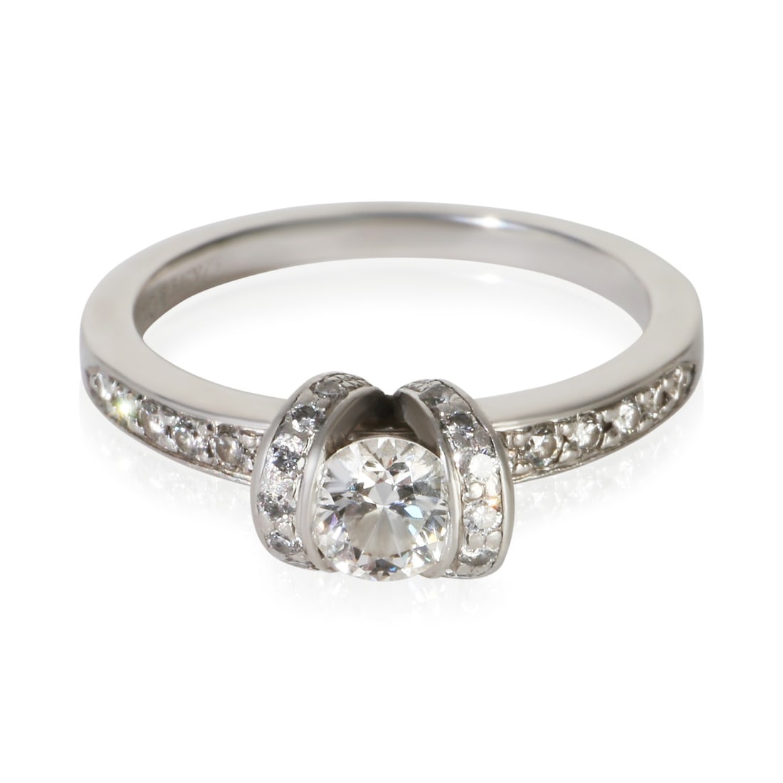 Platinum Engagement Ring Tiffany & Co. Ribbon 0.42 ct Round Diamond: Platinum Engagement Ring Tiffany & Co. Ribbon 0.42 ct Round Diamond Pre-owned Tiffany & Co. Ribbon engagement ring featuring a round brilliant diamond center accented by side diamonds. Includes the or