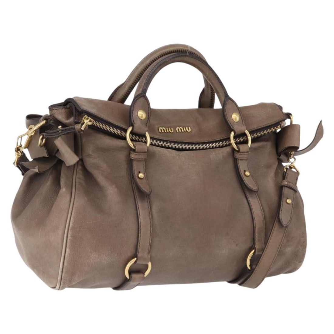 Miu Miu Beige Gold Leather 2 Way Handbag with Strap: Miu Miu Beige Gold Leather 2 Way Handbag with Strap Miu Miu leather hand bag in beige and gold, made in Turkey. This women's bag features a shoulder strap and handle with the dimensions listed below. 