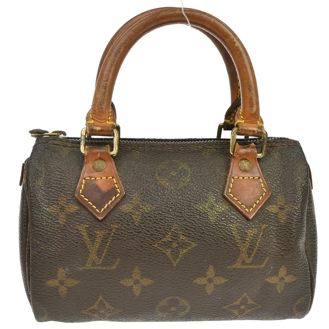 Louis Vuitton Speedy Mini Monogram Canvas Handbag M41534: Louis Vuitton Speedy Mini Monogram Canvas Handbag M41534 Vintage Louis Vuitton Mini Speedy handbag in brown Monogram canvas with leather trim and a zip closure. This women's handbag is made in France 