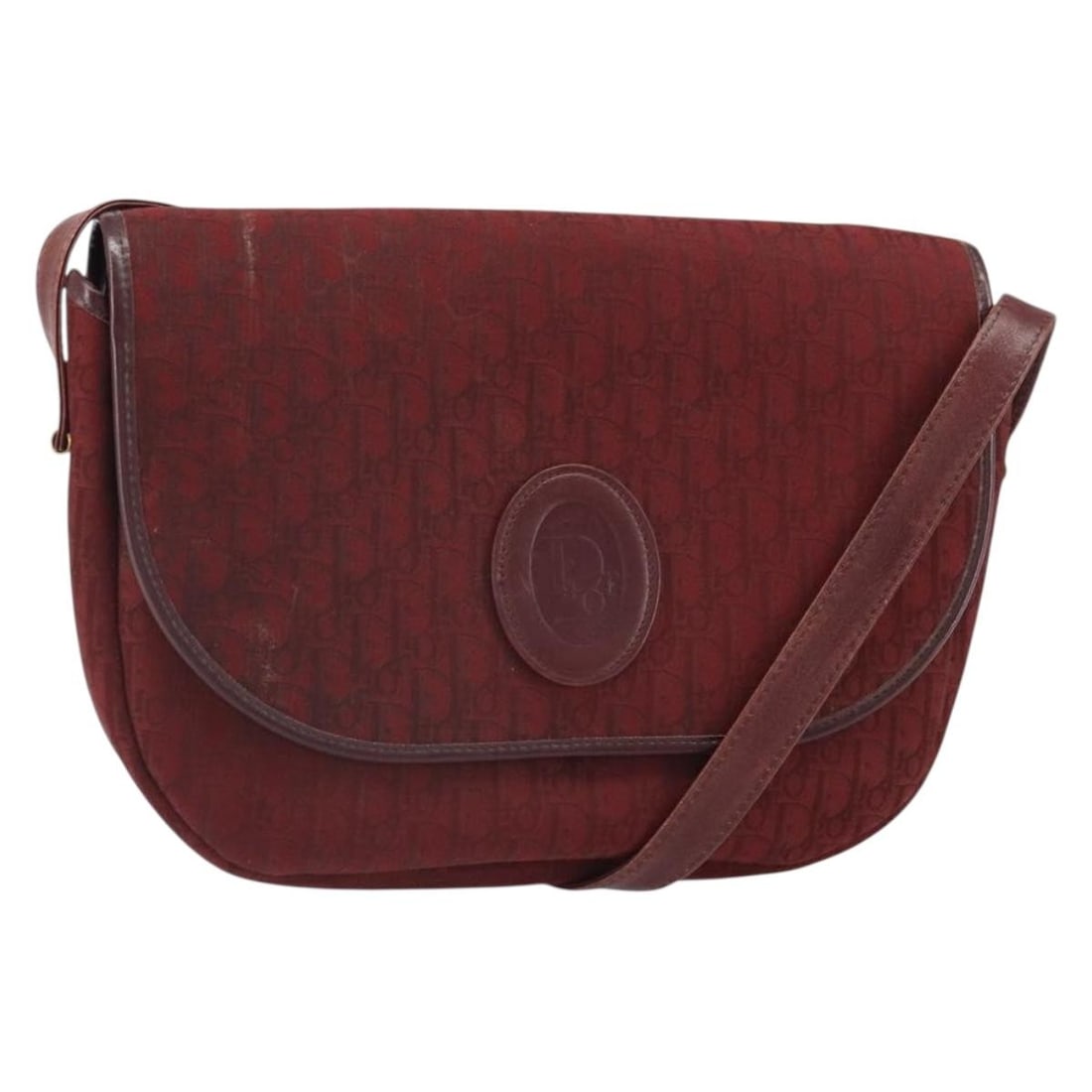 Christian Dior Trotter Shoulder Bag in Red Canvas Gold Tone: Christian Dior Trotter Shoulder Bag in Red Canvas Gold Tone A Christian Dior Trotter canvas shoulder bag in red and gold, made in France. The bag is described as a heavily used shoulder bag with visib