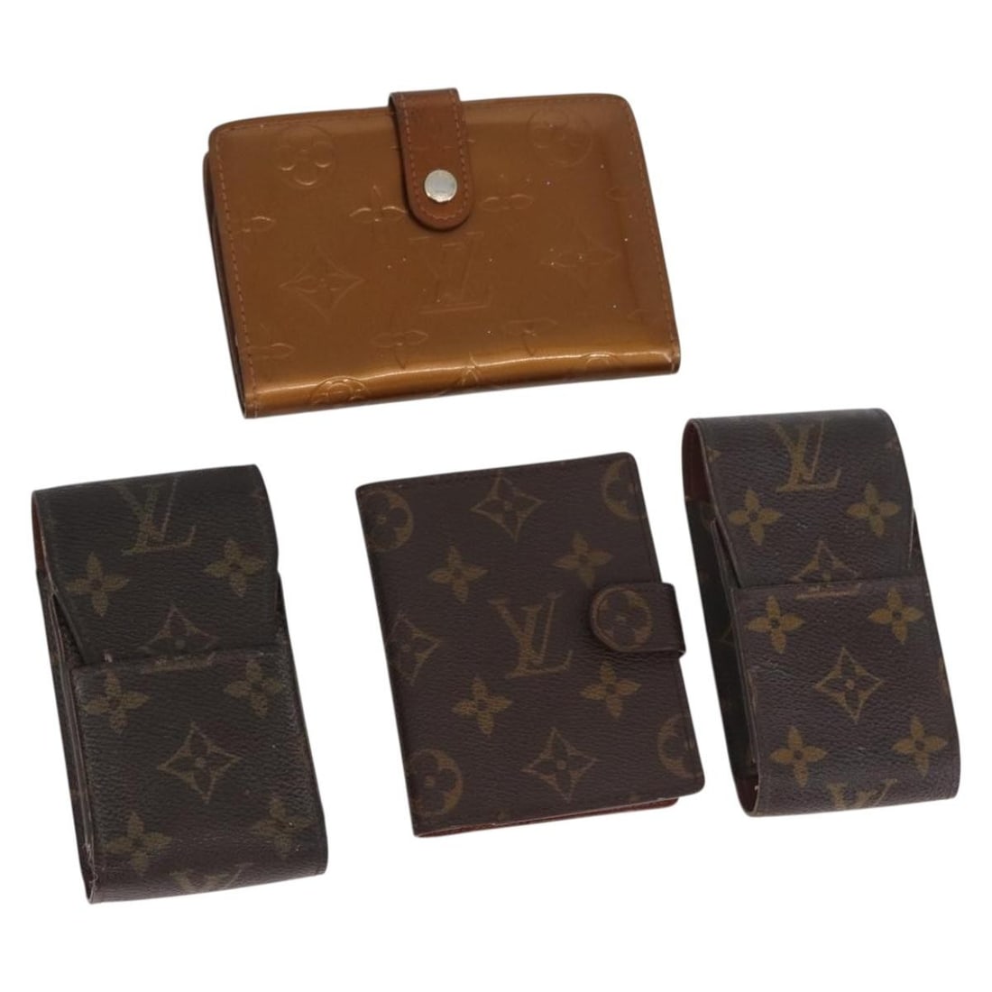 Set of 4 Louis Vuitton Monogram Brown Wallets France: Set of 4 Louis Vuitton Monogram Brown Wallets France Louis Vuitton wallet in Monogram/Brown with a Monogram Canvas exterior, made in France. The item is offered as shown in the photo only, with no box
