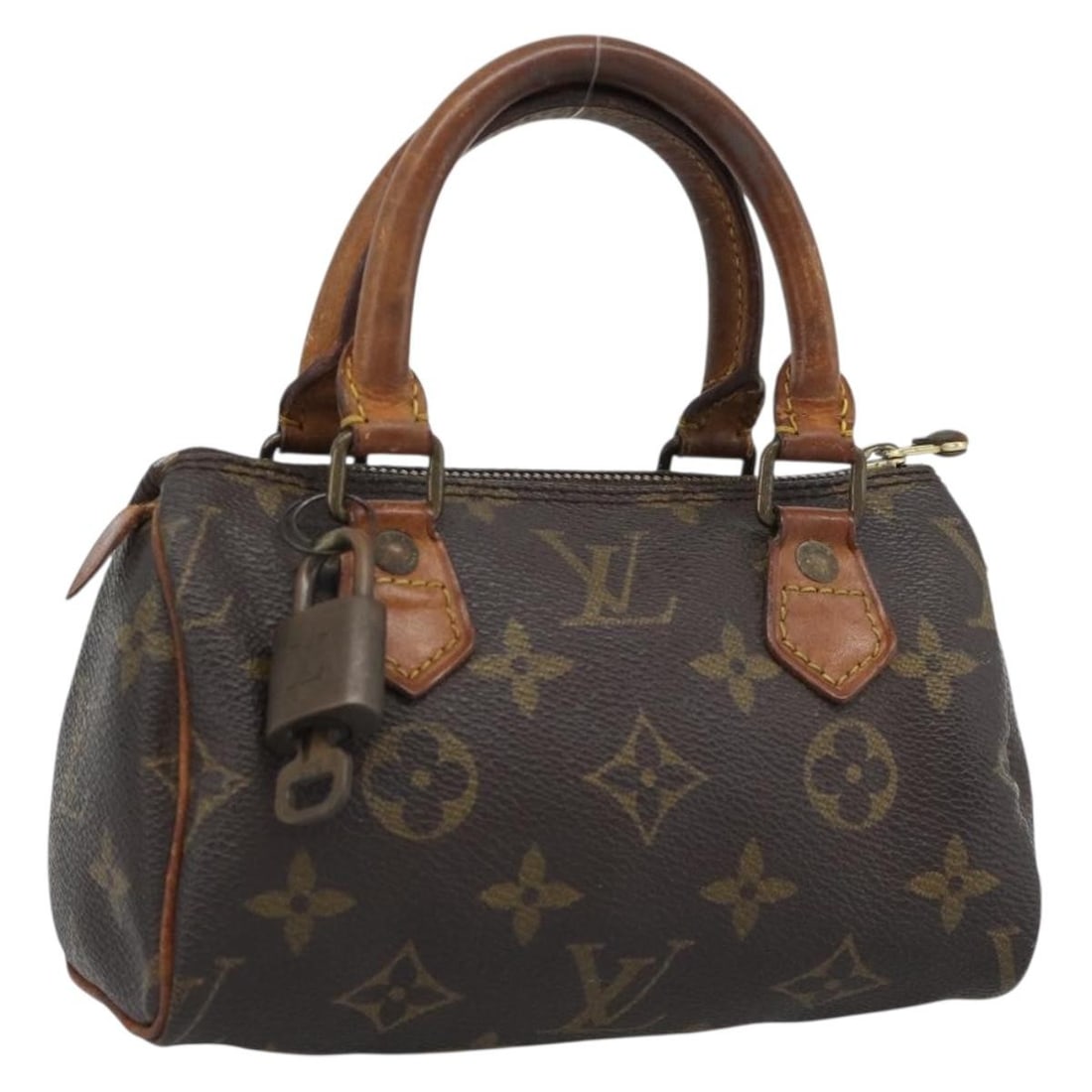 Louis Vuitton Mini Speedy M41534 Monogram Canvas Handbag: Louis Vuitton Mini Speedy M41534 Monogram Canvas Handbag Louis Vuitton Monogram Mini Speedy Hand Bag in Monogram Canvas, made in France. This women's hand bag comes with a padlock and one key. The bag