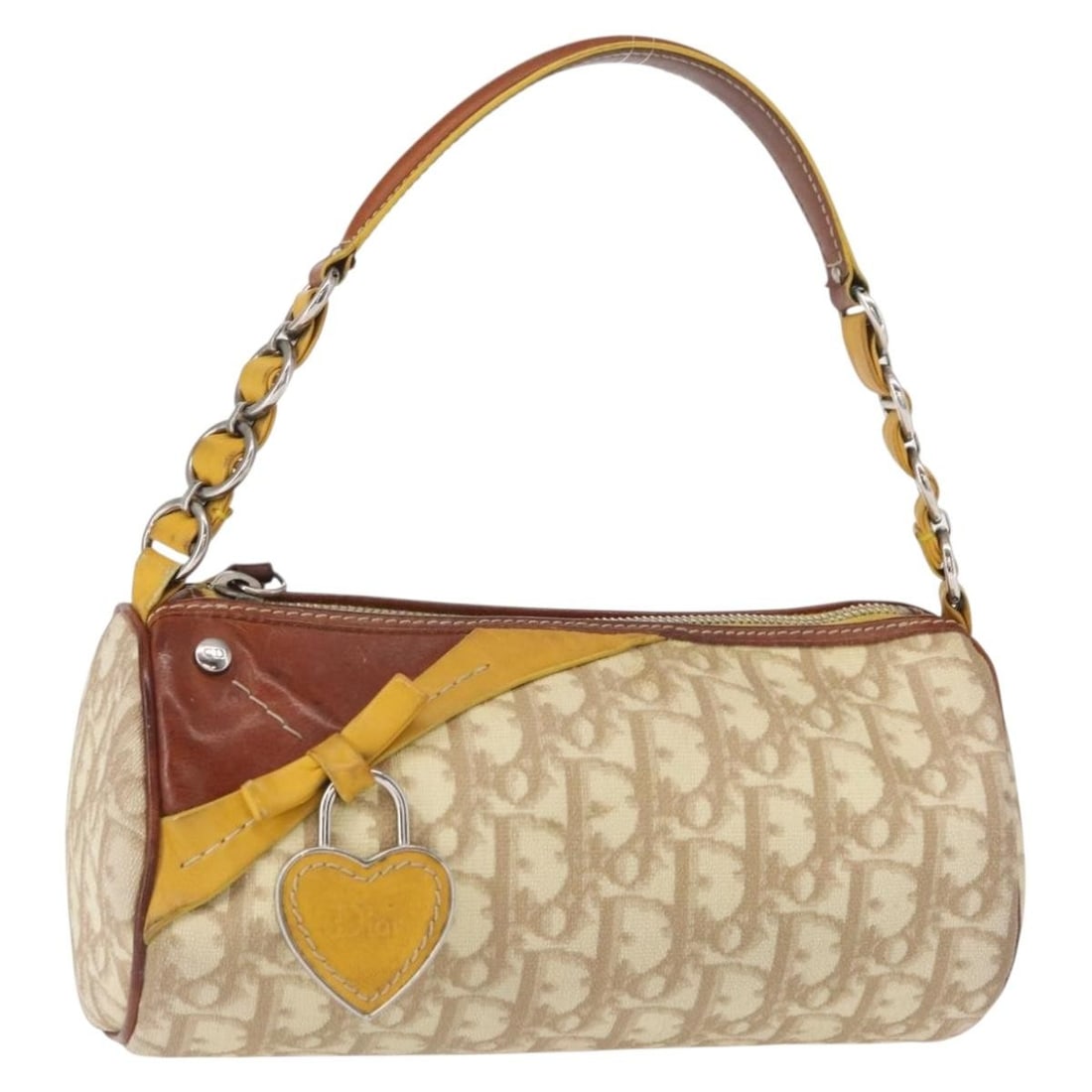 Christian Dior Trotter PVC Hand Bag Beige Silver Auth CM0037: Christian Dior Trotter PVC Hand Bag Beige Silver Auth CM0037 This elegant Christian Dior Trotter Canvas Romantic Hand Bag is a stylish accessory crafted in Spain. Made from durable PVC leather with a 