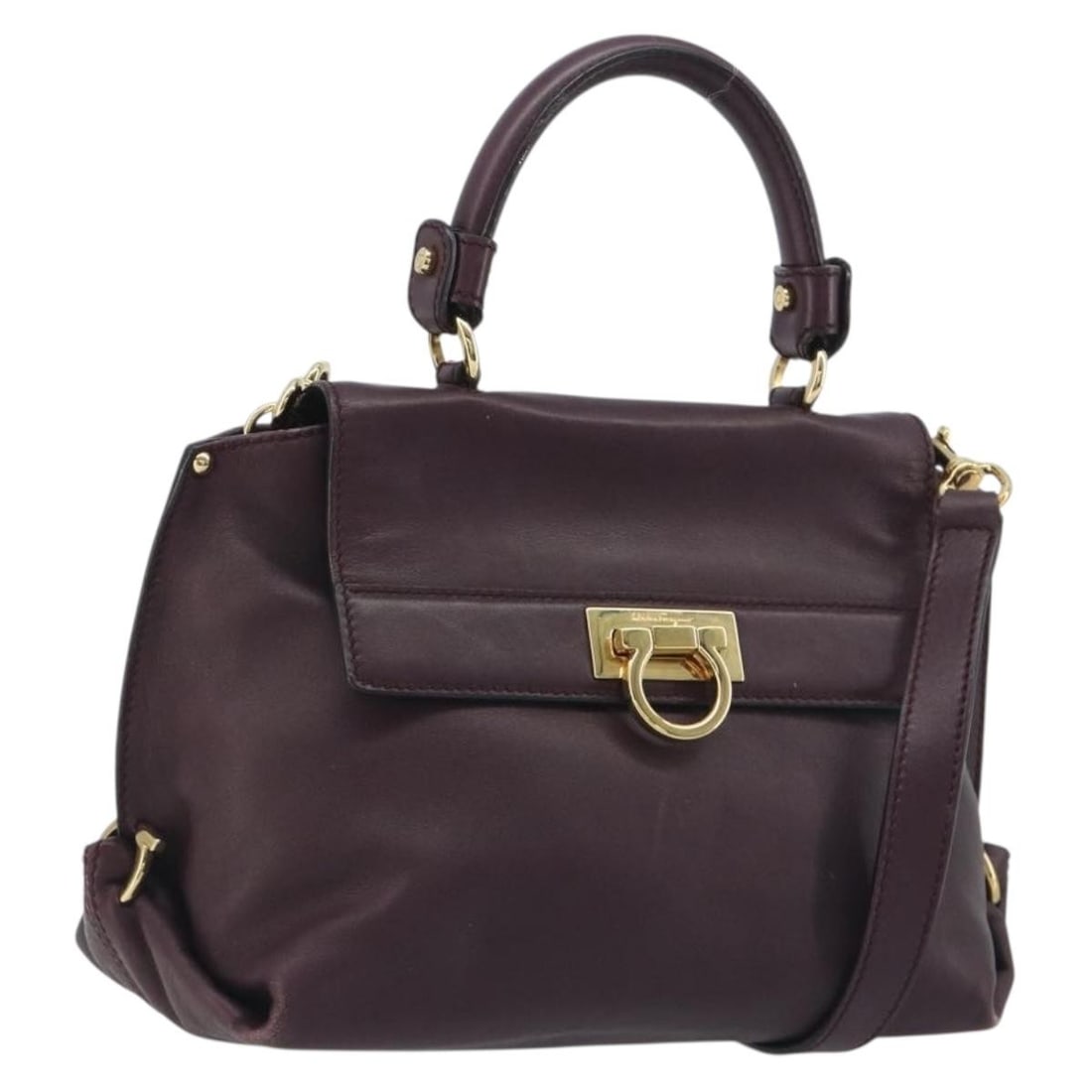 Leather 2way Hand Bag Salvatore Ferragamo Gancini Purple with Shoulder Strap: Leather 2way Hand Bag Salvatore Ferragamo Gancini Purple with Shoulder Strap Salvatore Ferragamo Gancini handbag in purple leather with a gold tone finish. This 2-way style comes with a shoulder strap