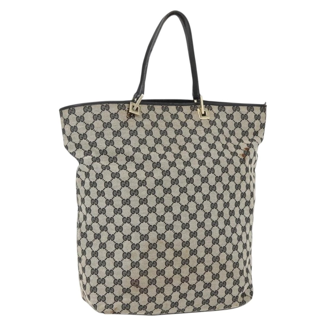 Gucci GG Canvas Navy and Gold Tote Bag 002 1097 3444 Italy: Gucci GG Canvas Navy and Gold Tote Bag 002 1097 3444 Italy This is a Gucci GG Canvas tote bag in navy and gold, crafted in Italy. The tote features canvas material with the iconic GG pattern and gold-
