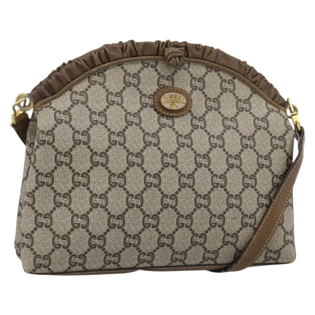 Gucci GG Plus Supreme PVC Shoulder Bag Beige Gold: Gucci GG Plus Supreme PVC Shoulder Bag Beige Gold Gucci GG Plus Supreme shoulder bag in beige and gold, made from PVC leather and GG canvas. It is a shoulder bag made in Italy with dimensions of appro