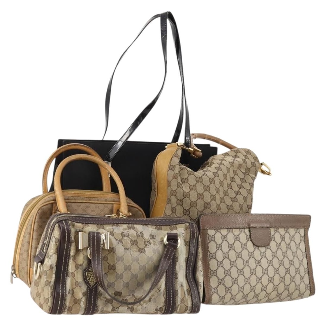 Set of 5 Gucci Micro GG Supreme coated canvas handbags: Set of 5 Gucci Micro GG Supreme coated canvas handbags Gucci GG Supreme micro GG crystal bag in coated canvas, presented as a hand bag in black, beige, and brown. Made in Italy, this item is offered a