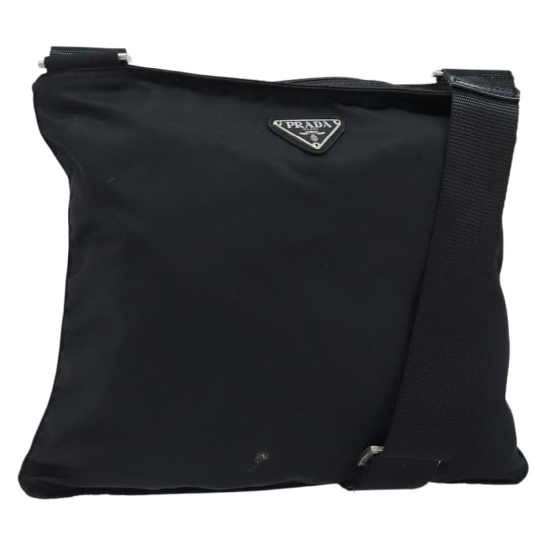 Prada Black Nylon Shoulder Bag with Adjustable Strap Silver Hardware: Prada Black Nylon Shoulder Bag with Adjustable Strap Silver Hardware This PRADA shoulder bag is crafted from black nylon with silver-tone accents. Made in Italy, it features an adjustable shoulder str