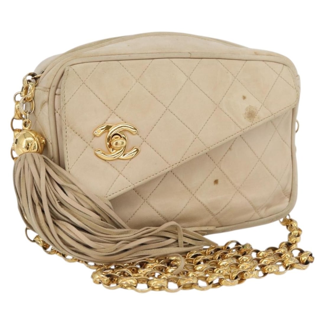 Chanel Ivory Lambskin Matelasse Shoulder Bag with Gold Chain and CC Logo: Chanel Ivory Lambskin Matelasse Shoulder Bag with Gold Chain and CC Logo This CHANEL Matelasse chain shoulder bag is crafted from lambskin leather in an ivory and gold color combination. Designed for 