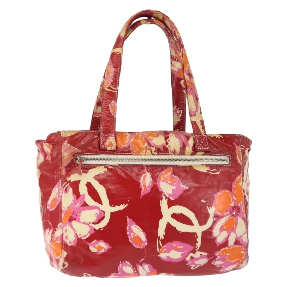 Chanel Red Coated Canvas High Summer Collection Tote Bag: Chanel Red Coated Canvas High Summer Collection Tote Bag This CHANEL High Summer tote bag features a vibrant red coated canvas exterior with the iconic CC logo. Made in Italy, the tote offers a spacio
