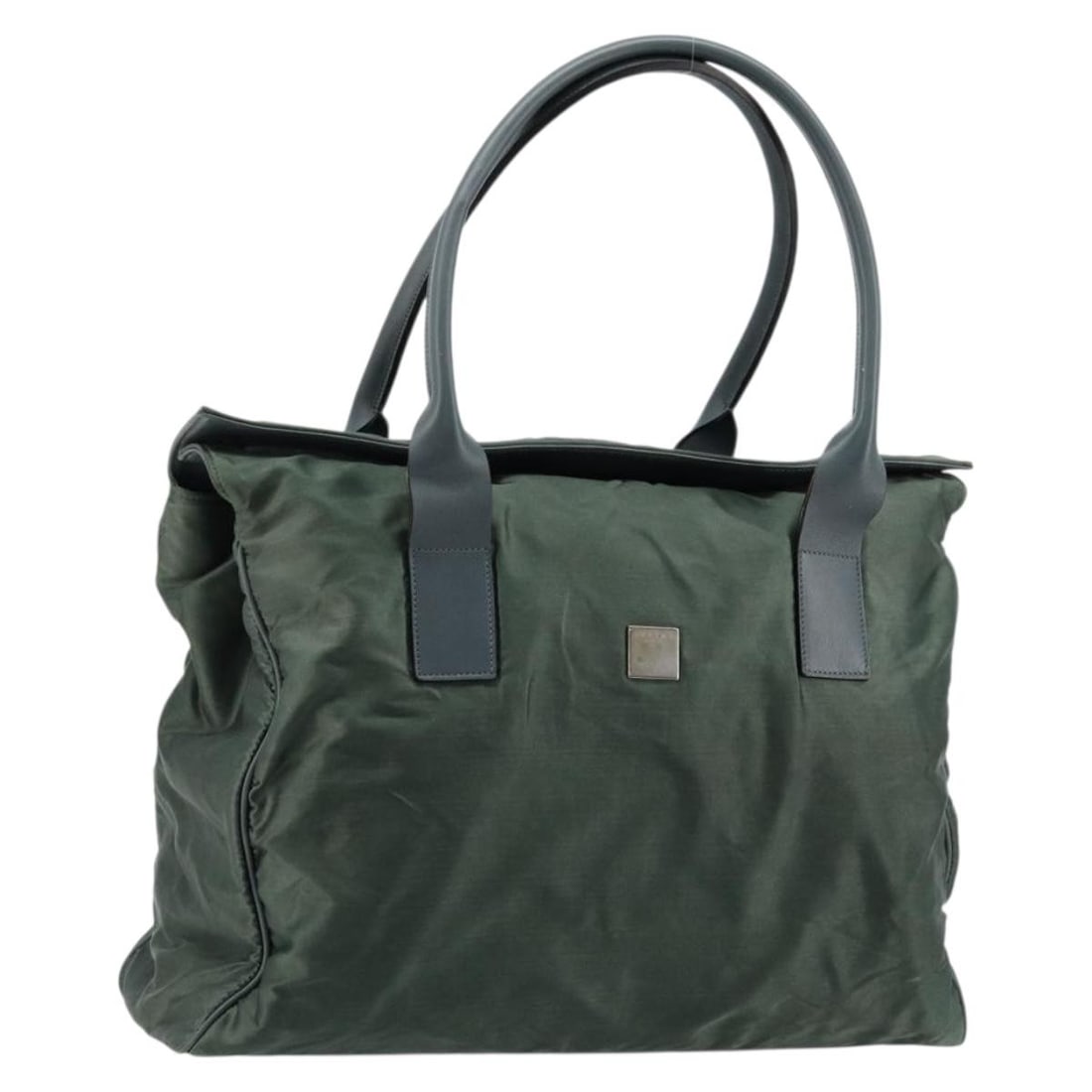 CELINE Green Nylon Tote Bag Italy Silver Trim: CELINE Green Nylon Tote Bag Italy Silver Trim This CELINE tote bag is crafted from green and silver nylon, offering a spacious and practical design. Made in Italy, it features dual handles with an 8.3