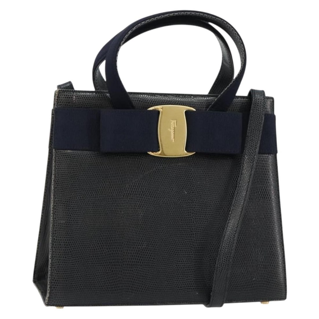 Salvatore Ferragamo Vala 2way Leather Handbag Navy Gold Tone: Salvatore Ferragamo Vala 2way Leather Handbag Navy Gold Tone Salvatore Ferragamo Vala 2-way handbag in navy leather with gold-tone accents. Made in Italy, this women's bag includes a shoulder strap fo