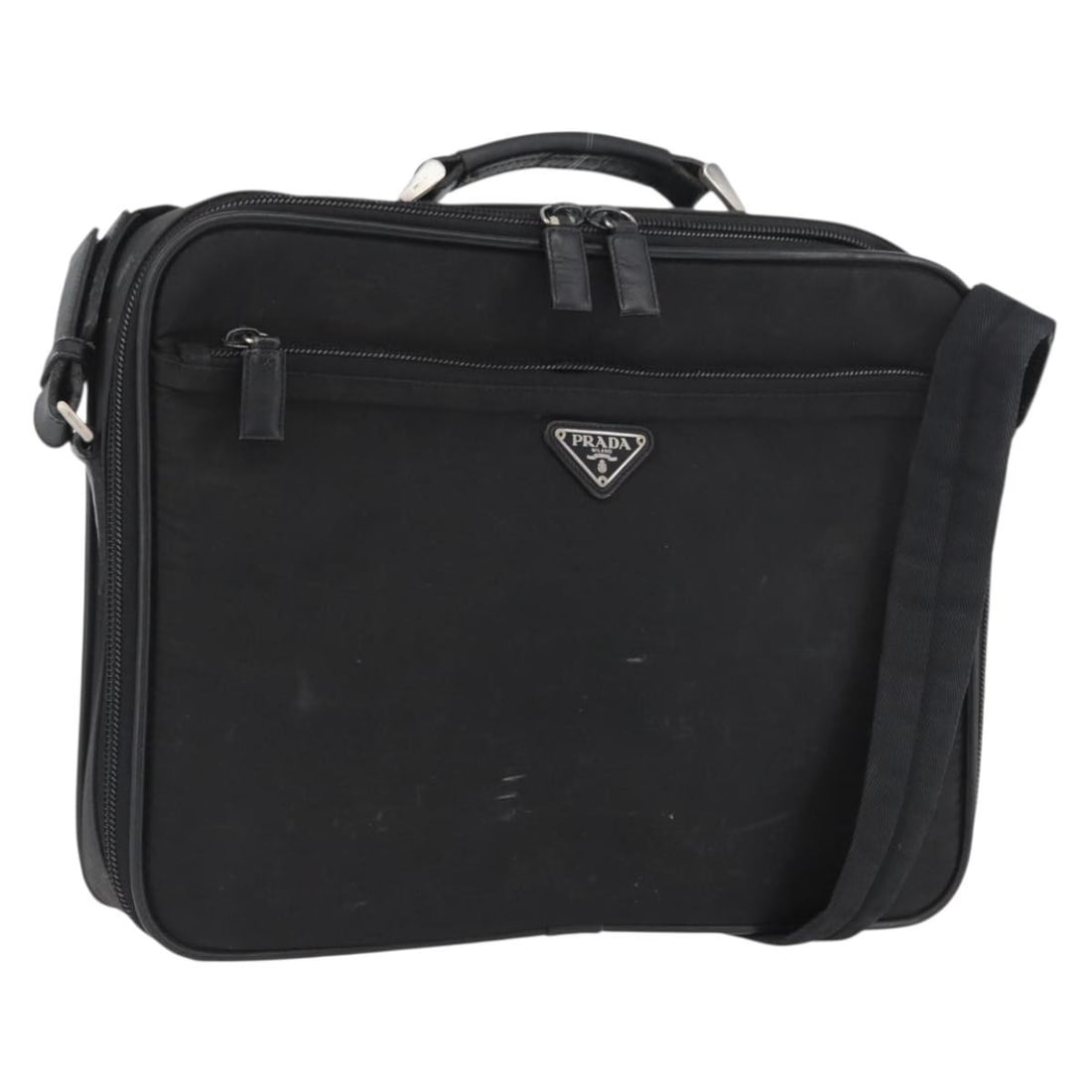 Prada Black Nylon Shoulder Bag Silver Tone Hardware Italy: Prada Black Nylon Shoulder Bag Silver Tone Hardware Italy This PRADA shoulder bag is crafted from black nylon with silver-tone accents. Designed for women, it features a spacious main compartment and 
