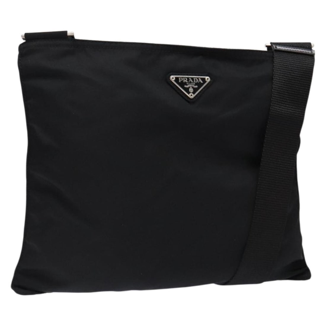 Black Nylon Shoulder Bag by Prada Silver Tone Hardware: Black Nylon Shoulder Bag by Prada Silver Tone Hardware Black Prada shoulder bag made of nylon with silver-tone metal fittings. Made in Italy, this bag measures approximately 30 cm wide by 25 cm high, 