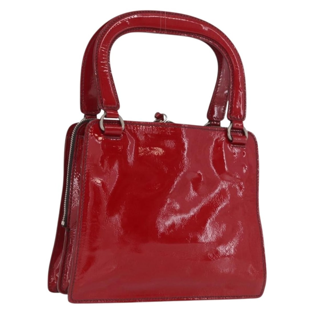 Red and Silver Patent Leather Miu Miu Handbag with Dust Bag: Red and Silver Patent Leather Miu Miu Handbag with Dust Bag This Miu Miu handbag features a striking red and silver patent leather exterior with silver-tone hardware. The bag is crafted in Italy and i