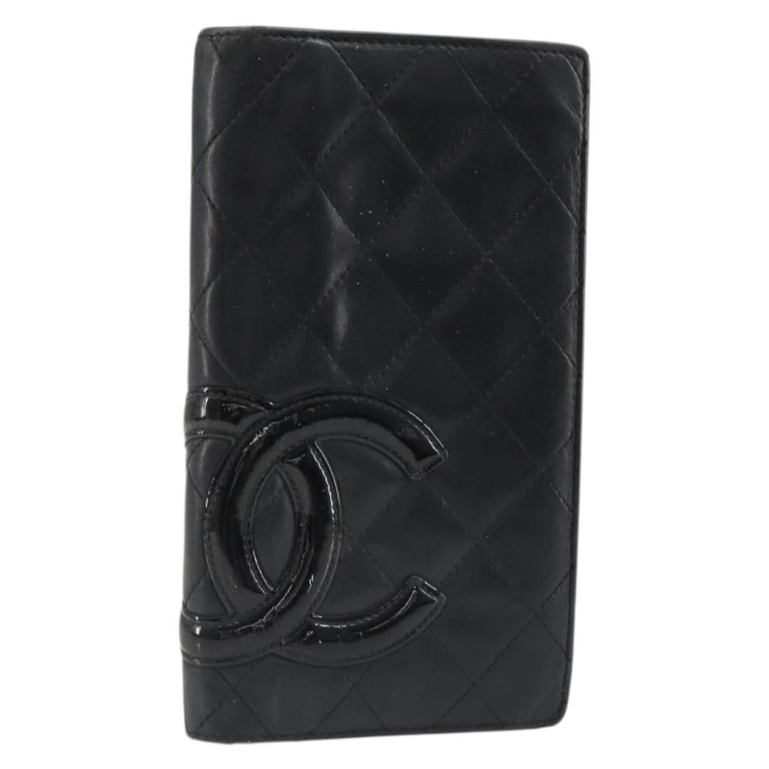 Black Lamb Skin Wallet CHANEL Cambon Line CC Italy: Black Lamb Skin Wallet CHANEL Cambon Line CC Italy Black CHANEL wallet in lamb skin, made in Italy. The item is heavily used and shows rubbing, slight loss of shape, scratches on the metal fittings, a