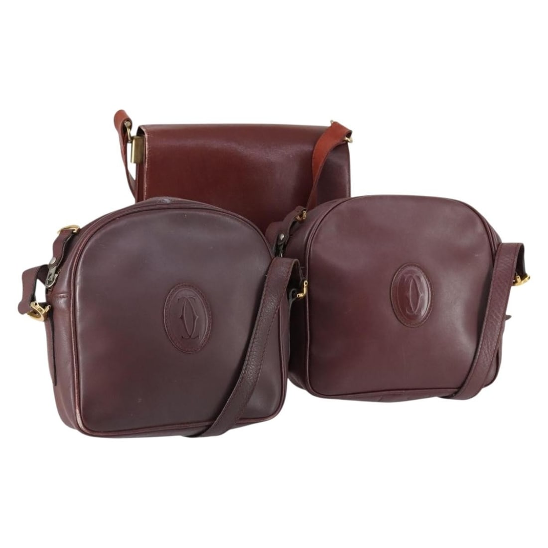 CARTIER Bordeaux Leather Shoulder Bag 3 Piece Set Authentic: CARTIER Bordeaux Leather Shoulder Bag 3 Piece Set Authentic This authentic CARTIER shoulder bag is crafted from luxurious bordeaux leather, showcasing a classic design perfect for any occasion. The ba