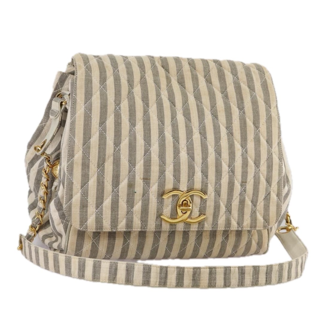 Chanel Matelasse CC Chain Shoulder Bag Gray Canvas Gold Tone: Chanel Matelasse CC Chain Shoulder Bag Gray Canvas Gold Tone A CHANEL Matelasse Big COCO Mark chain shoulder bag in gray and gold canvas. Made in Italy, this shoulder bag features a CC mark design and