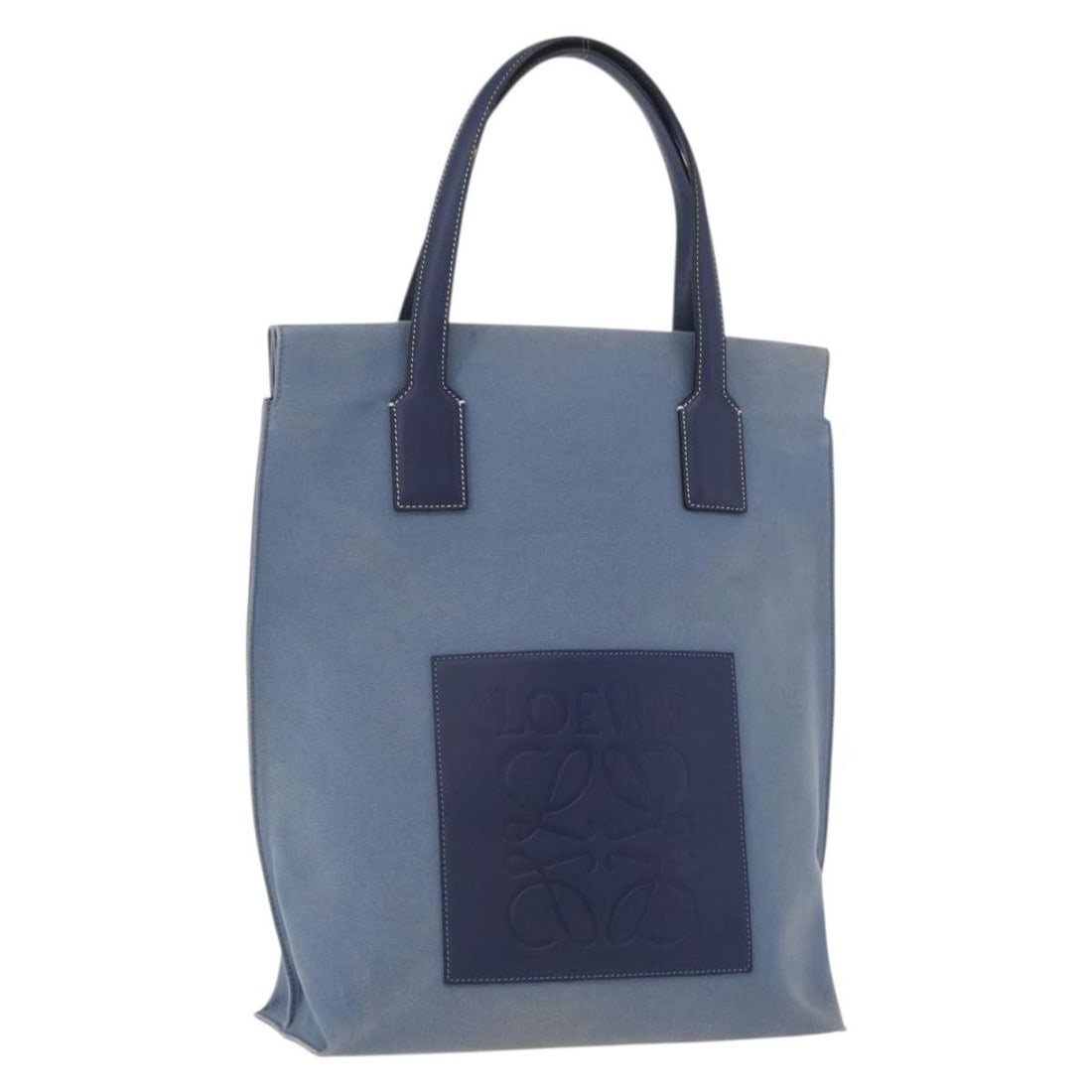 LOEWE Canvas Tote Handbag Light Blue Silver Made in Spain: LOEWE Canvas Tote Handbag Light Blue Silver Made in Spain LOEWE tote bag in light blue and silver canvas, made in Spain. This women's bag measures approximately 31 cm wide, 41 cm high, and 12 cm deep,