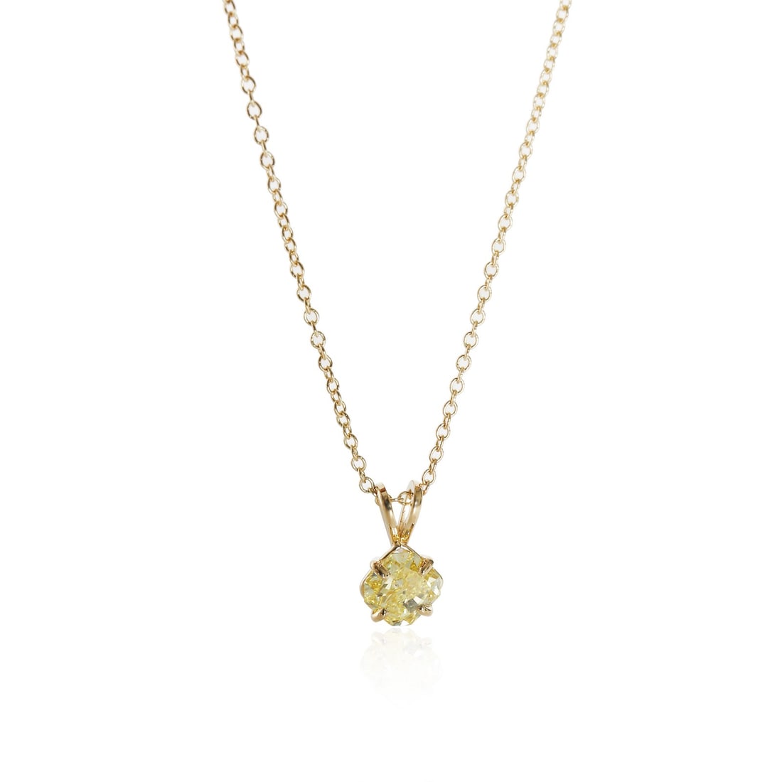 GIA Certified 1.01 ct Fancy Intense Yellow Radiant Pendant 14K Gold: GIA Certified 1.01 ct Fancy Intense Yellow Radiant Pendant 14K Gold This elegant solitaire pendant features a 1.01 carat fancy intense yellow radiant cut diamond set in 14K yellow gold. The diamond is