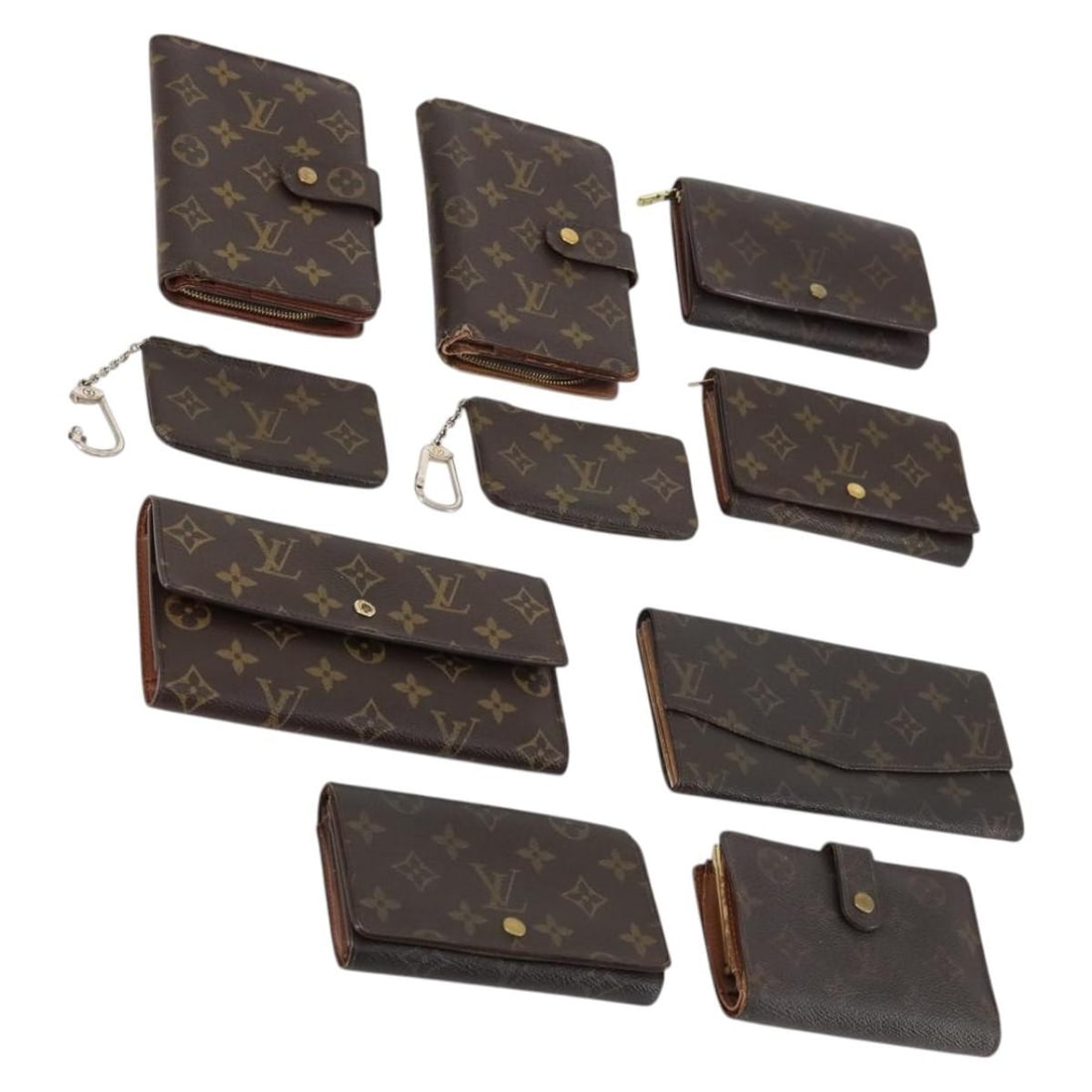 10 Piece Louis Vuitton Monogram Canvas Wallet Lot: 10 Piece Louis Vuitton Monogram Canvas Wallet Lot A Louis Vuitton monogram wallet in Monogram Canvas, offered as-is in heavily used condition. The item is from a special set offer and will be sent as 