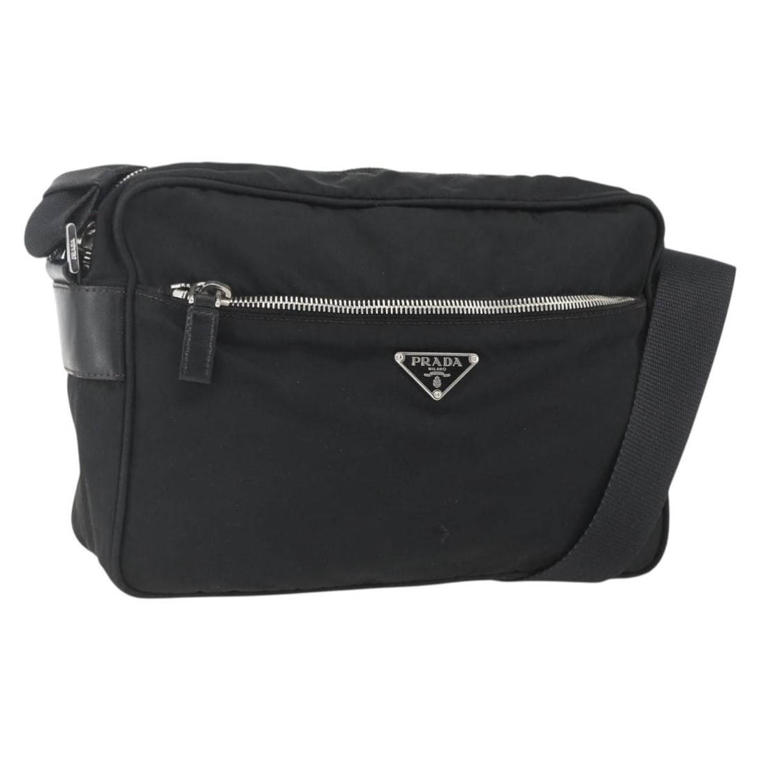 Prada black nylon women shoulder bag Italy silver trim: Prada black nylon women shoulder bag Italy silver trim This PRADA shoulder bag is crafted from black nylon with silver-tone accents and was made in Italy. The bag features adjustable shoulder straps a