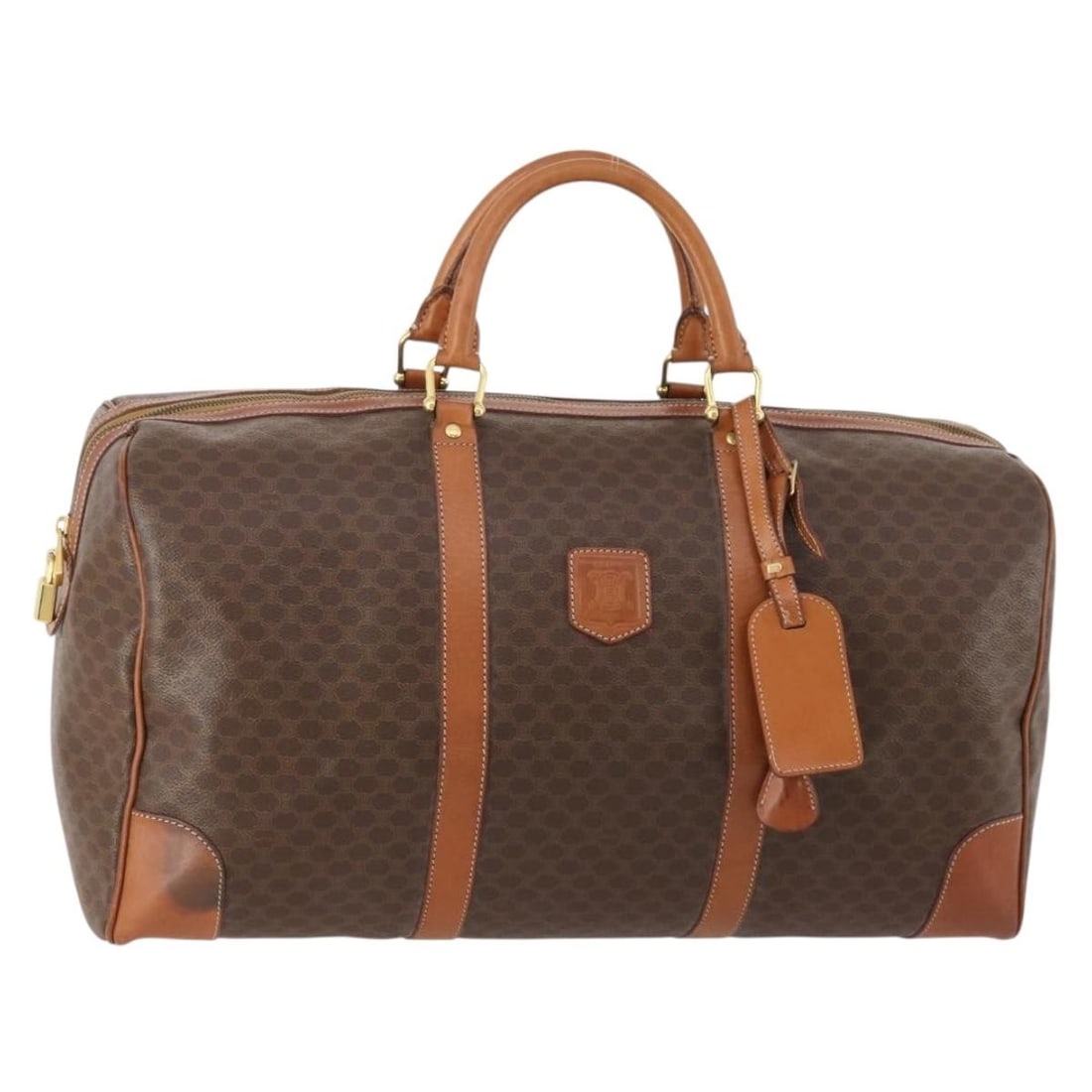 CELINE Macadam Boston Bag Brown PVC Leather with Padlock Key: CELINE Macadam Boston Bag Brown PVC Leather with Padlock Key Celine Macadam canvas Boston bag in brown with gold-tone accents, crafted with PVC leather trim. This women's bag includes a padlock, one k