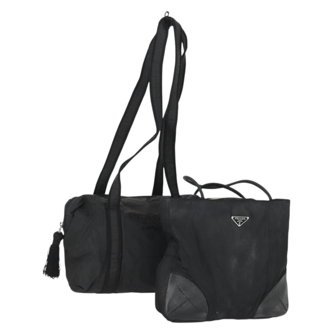 Prada black nylon shoulder bag 2 piece set: Prada black nylon shoulder bag 2 piece set This is a PRADA women's shoulder bag set crafted from black nylon. Made in Italy, the bags feature noticeable signs of use, including out-of-shape surfaces, 