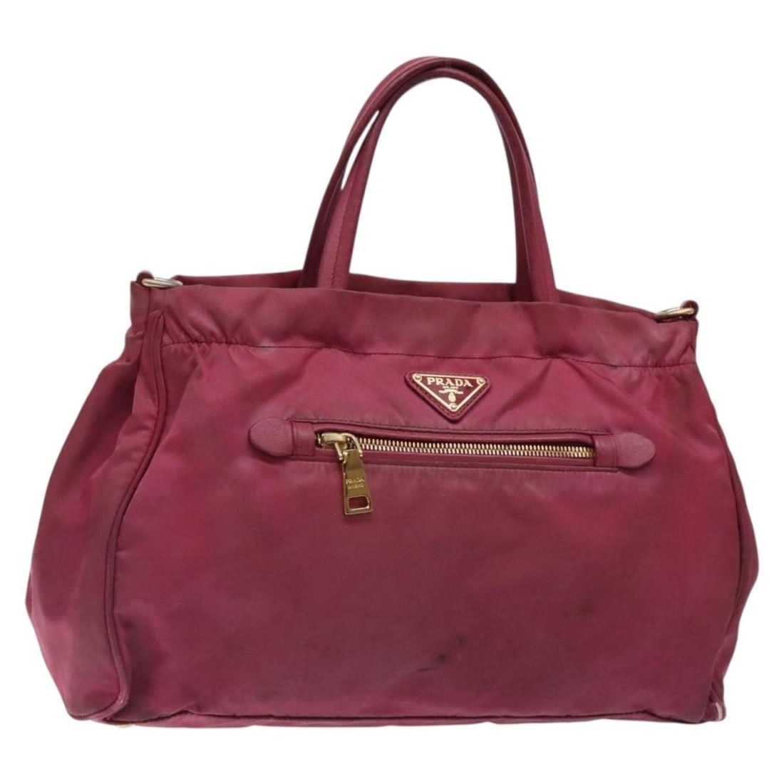PRADA Pink Nylon Hand Bag Gold Tone Italy: PRADA Pink Nylon Hand Bag Gold Tone Italy Prada women's handbag in pink and gold nylon, made in Italy. This heavily used bag shows visible wear throughout, including loss of shape, rubbing, stains, sc