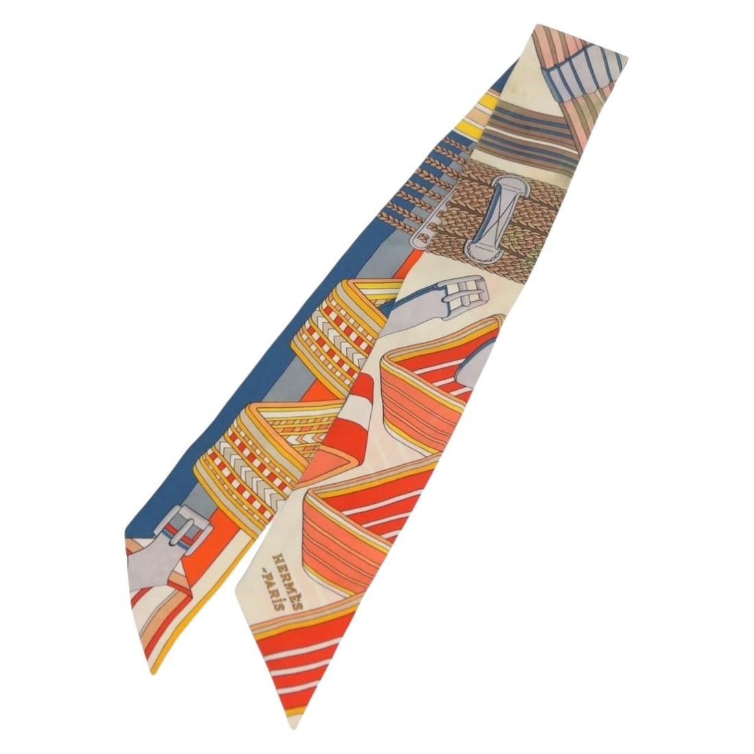 Hermes Sangles En Zigzag Twilly Silk Scarf Ivory France: Hermes Sangles En Zigzag Twilly Silk Scarf Ivory France Hermes Twilly scarf in silk, featuring the "SANGLES EN ZIGZAG" design in ivory. Made in France and offered with the item box. Condition is heavi