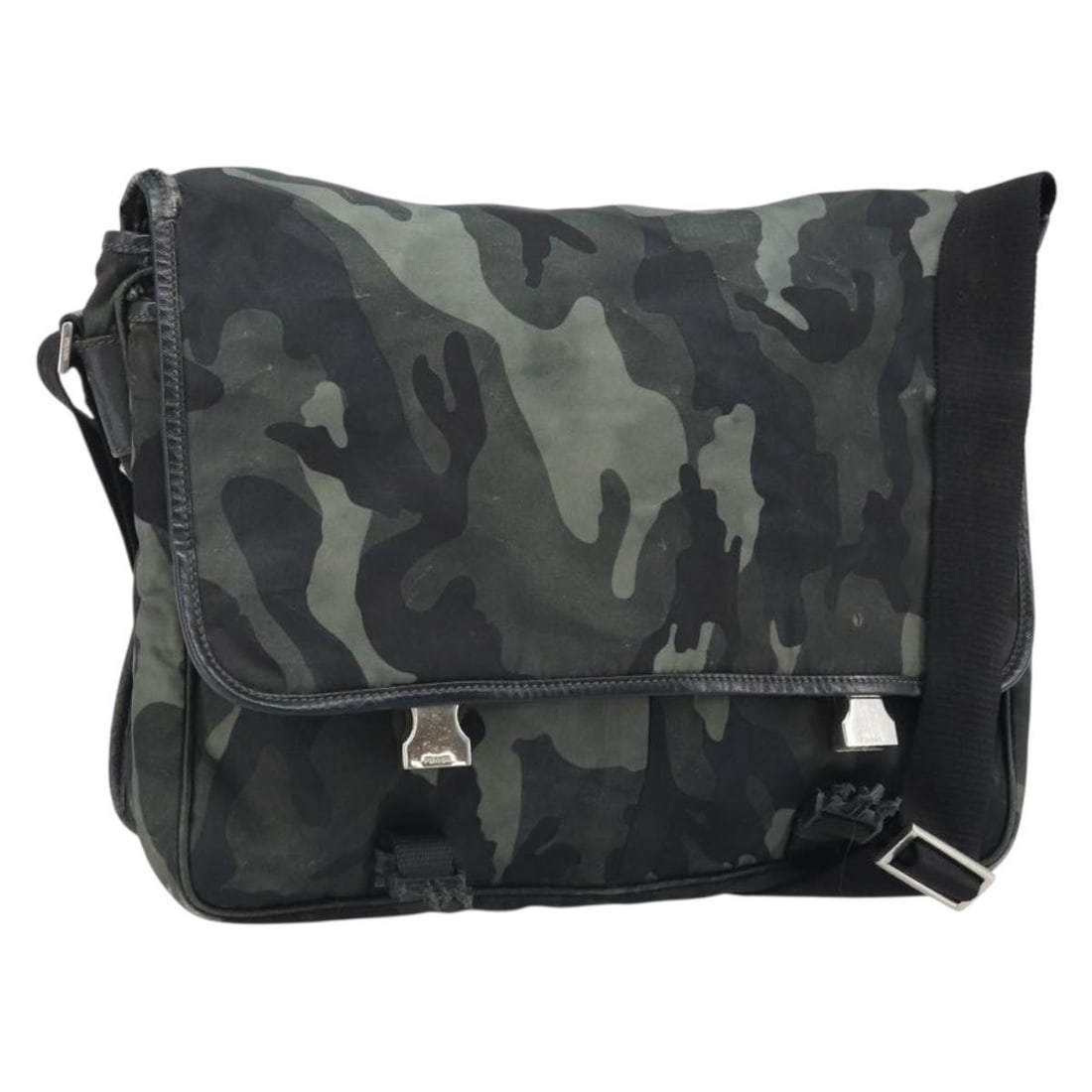 Prada Khaki Nylon Shoulder Bag Silver Tone Hardware: Prada Khaki Nylon Shoulder Bag Silver Tone Hardware This Prada shoulder bag is crafted from nylon in khaki with silver-tone hardware. Made in Italy, it features a shoulder bag style and comes with the