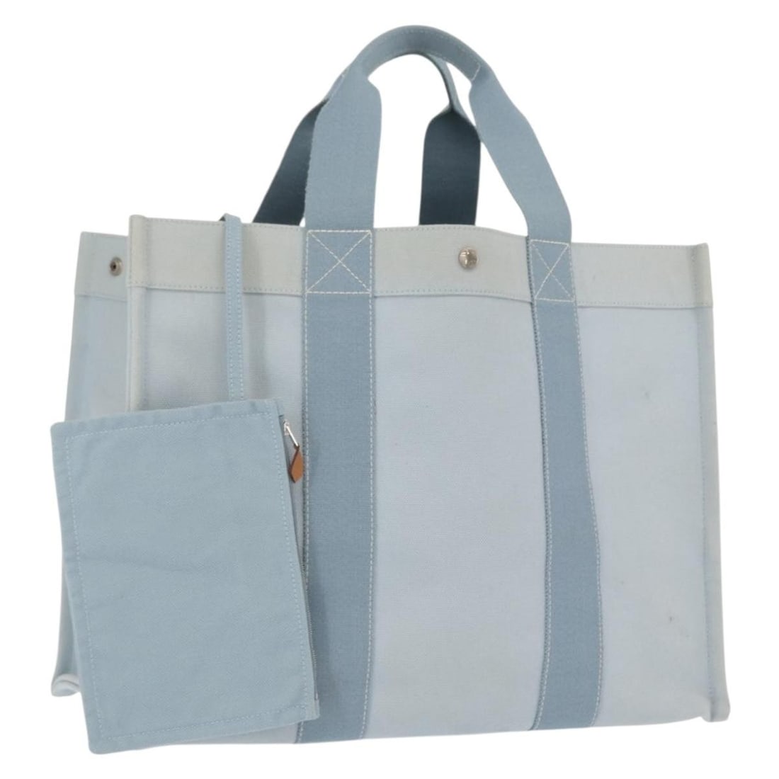 Hermes Bora Bora GM Canvas Tote Light Blue Silver with Pouch: Hermes Bora Bora GM Canvas Tote Light Blue Silver with Pouch This HERMES Bora Bora GM tote bag features a light blue and silver canvas exterior. It comes with a matching pouch and is designed with amp