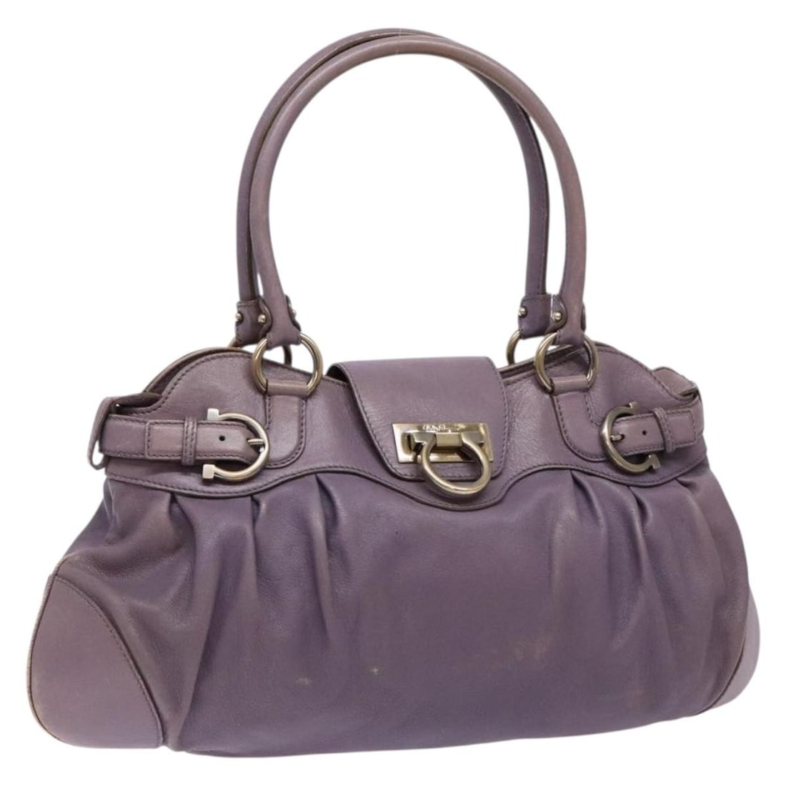 Salvatore Ferragamo Purple Leather Gancini Handbag Italy: Salvatore Ferragamo Purple Leather Gancini Handbag Italy This Salvatore Ferragamo Gancini handbag is crafted from purple leather and features a classic, structured silhouette. The bag is designed for 