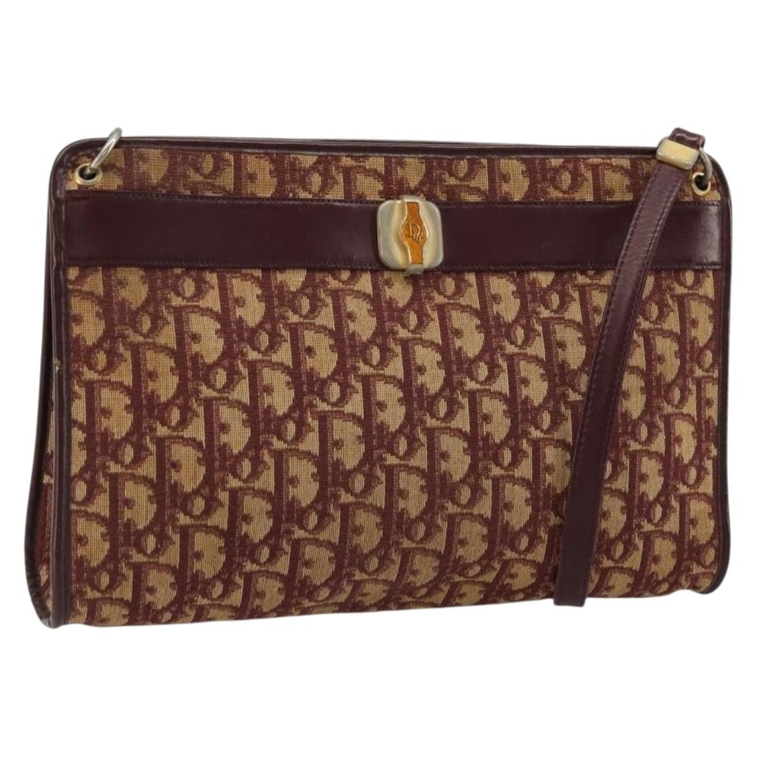 Red Gold Trotter Canvas Christian Dior Shoulder Bag: Red Gold Trotter Canvas Christian Dior Shoulder Bag This Christian Dior shoulder bag is crafted from Trotter Canvas in a striking red and gold color combination. Designed for women, it features a spac
