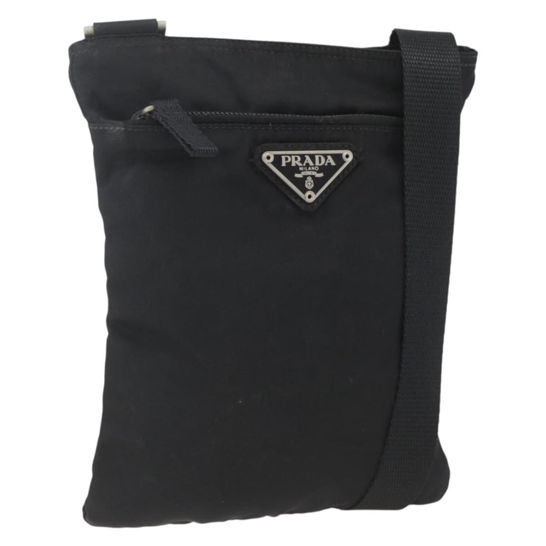 Prada black nylon shoulder bag silver trim Italy: Prada black nylon shoulder bag silver trim Italy This PRADA shoulder bag is crafted from black nylon with silver-tone accents and is designed for women. Made in Italy, the bag features a compact silho