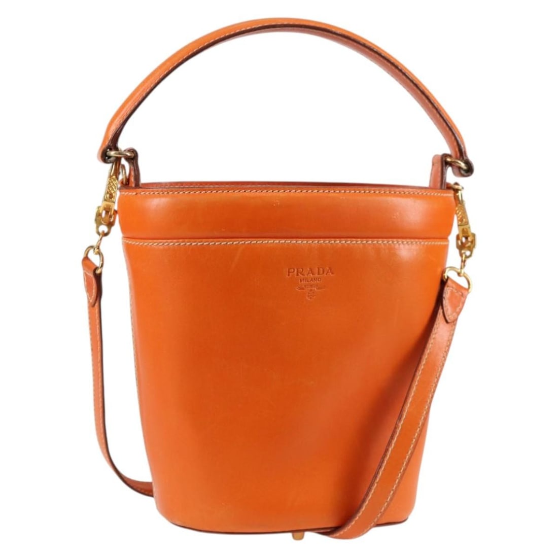 PRADA 2way Shoulder Bag Leather Orange Gold Made in Italy: PRADA 2way Shoulder Bag Leather Orange Gold Made in Italy This authentic PRADA shoulder bag is a stylish blend of orange and gold leather, crafted in Italy. With a compact design, it measures approxim
